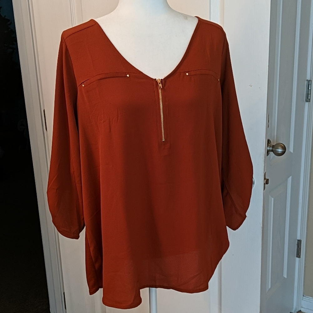 Deep fall colored top with gold accents